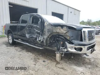 2017 Nissan Titan XD SL with VIN 1N6BA1F28HN516350, listed as a Copart auction lot 72570904 with 118,339 mi miles and Salvage Title. Bid and sale history available at carsss.com. Image 4.