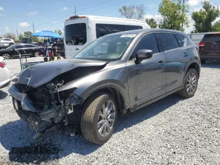2021 Mazda CX-5 Grand Touring with VIN JM3KFADMXM1300565, listed as a Copart auction lot 53003705 with 40,911 mi miles and Non Repairable. Bid and sale history available at carsss.com. Image 1.