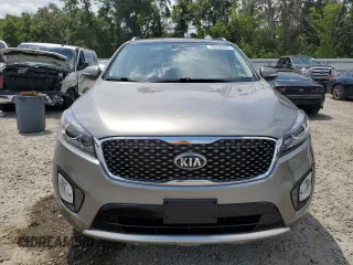 2016 Kia Sorento SX z VIN 5XYPKDA52GG141330, wystawiony jako Copart lot #55448425 z przebiegiem 78 330 mil mil oraz Szkoda całkowita • Salvage title. Historia ofert i sprzedaży dostępna na DreamBid. Obrazek 5.