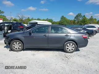 2009 Toyota Camry with VIN 4T1BE46KX9U879566, listed as a IAAI auction lot 42020660 with 207,291 mi miles. Bid and sale history available at carsss.com. Image 15.