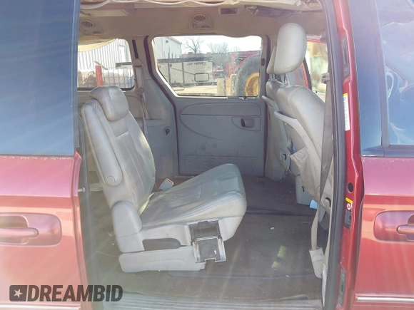 2005 Chrysler Town & Country Touring with VIN 2C8GP54L65R233842, listed as a IAAI auction lot 41682211 with 232,830 mi miles. Bid and sale history available at carsss.com. Image 8.