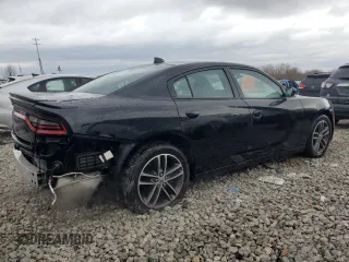 2019 Dodge Charger SXT with VIN 2C3CDXJG9KH523879, listed as a Copart auction lot 82988364 with 71,386 mi miles and Salvage Title. Bid and sale history available at DreamBid. Image 3.