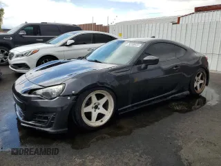 2015 Subaru BRZ Series.Blue z VIN JF1ZCAC14F9603892, wystawiony jako Copart lot #63081395 z przebiegiem 126 542 mil mil oraz Czysty tytuł • Clean title. Historia ofert i sprzedaży dostępna na DreamBid. Obrazek 1.