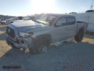 2021 Toyota Tacoma 4WD SR with VIN 3TMCZ5AN0MM387047, listed as a Copart auction lot 88904395 with 71,619 mi miles and Salvage Title. Bid and sale history available at carsss.com. Image 1.