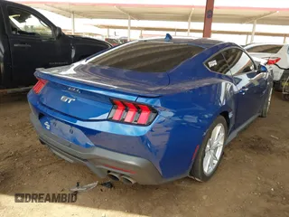 2024 Ford Mustang GT with VIN 1FA6P8CF8R5416890, listed as a IAAI auction lot 42382113 with 13,453 mi miles and . Bid and sale history available at DreamBid. Image 4.