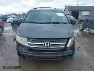 2011 Honda Odyssey Touring with VIN 5FNRL5H95BB007514, listed as a IAAI auction lot 41402516 with 281,032 mi miles. Bid and sale history available at carsss.com. Image 13.
