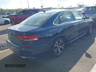 2021 Volkswagen Passat SE with VIN 1VWSA7A36MC010749, listed as a IAAI auction lot 42141065 with 43,571 mi miles and . Bid and sale history available at DreamBid. Image 4.