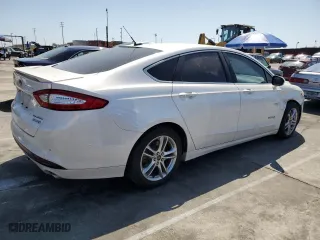 2015 Ford Fusion Titanium Hybrid with VIN 3FA6P0RUXFR245253, listed as a Copart auction lot 52189475 with 164,876 mi miles and Salvage Title. Bid and sale history available at carsss.com. Image 3.