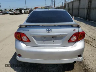 2010 Toyota Corolla with VIN 2T1BU4EE8AC427717, listed as a Copart auction lot 57528435 with 142,826 mi miles and Salvage title. Bid and sale history available at DreamBid. Image 6.