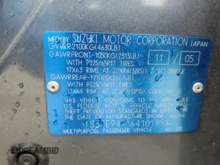 2006 Suzuki Grand Vitara Luxury z VIN JS3TE947164101951, wystawiony jako Copart lot #70110914 z przebiegiem 304 718 mil mil oraz Szkoda całkowita • Salvage title. Historia ofert i sprzedaży dostępna na DreamBid. Obrazek 14.