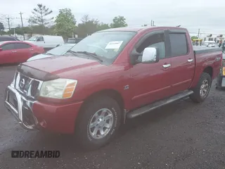2004 Nissan Titan LE z VIN 1N6AA07BX4N529440, wystawiony jako IAAI lot #42315667 z przebiegiem 146 955 mil mil oraz . Historia ofert i sprzedaży dostępna na DreamBid. Obrazek 2.
