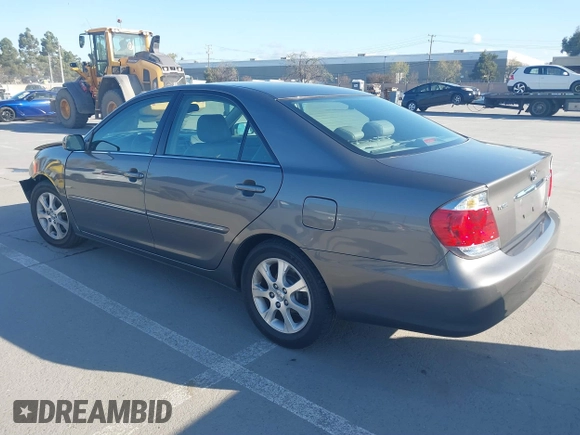 2005 Toyota Camry LE with VIN 4T1BF30K55U619313, listed as a IAAI auction lot 41854001 with 89,982 mi miles and . Bid and sale history available at DreamBid. Image 3.