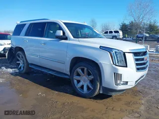 2016 Cadillac Escalade Luxury Collection with VIN 1GYS4BKJ6GR426614, listed as a IAAI auction lot 41604752 with 101,843 mi miles. Bid and sale history available at carsss.com. Image 1.