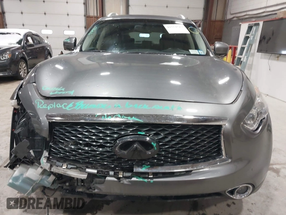 2017 Infiniti QX70 z VIN JN8CS1MU3HM143799, wystawiony jako IAAI lot #41554527 z przebiegiem 70 453 mil mil oraz . Historia ofert i sprzedaży dostępna na DreamBid. Obrazek 12.
