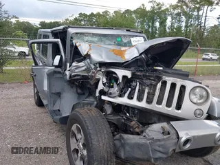 2016 Jeep Wrangler Unlimited Sahara with VIN 1C4BJWEG3GL240859, listed as a IAAI auction lot 42628937 with 103,378 mi miles and . Bid and sale history available at DreamBid. Image 6.