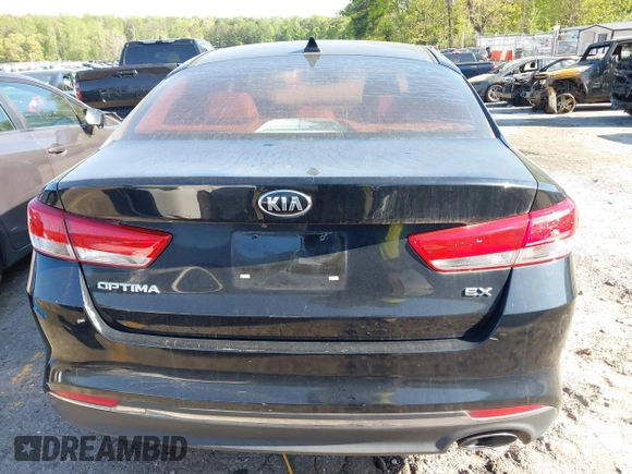 2016 Kia Optima EX z VIN 5XXGU4L35GG066083, wystawiony jako IAAI lot #41828804 z przebiegiem 112 396 mil mil oraz . Historia ofert i sprzedaży dostępna na DreamBid. Obrazek 16.