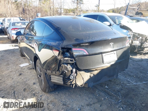 2022 Tesla Model 3 with VIN 5YJ3E1EA9NF147836, listed as a IAAI auction lot 41363603 with 28,748 mi miles. Bid and sale history available at carsss.com. Image 3.