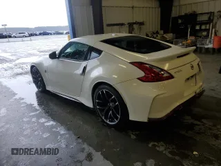 2016 Nissan 370Z Nismo с VIN JN1AZ4EH7GM930385, выставлен на аукционе Copart как лот 48208185 с пробегом 66 972 миль миль и Списание • Salvage title. История ставок и продаж доступна на DreamBid. Изображение 2.