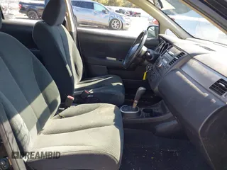 2012 Nissan Versa S with VIN 3N1BC1CP4CK807720, listed as a IAAI auction lot 41779696 with 151,612 mi miles. Bid and sale history available at carsss.com. Image 5.