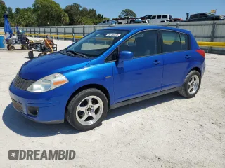 2009 Nissan Versa 1.8 S with VIN 3N1BC13E69L494607, listed as a Copart auction lot 52738515 with 164,102 mi miles and Salvage Title. Bid and sale history available at carsss.com. Image 1.
