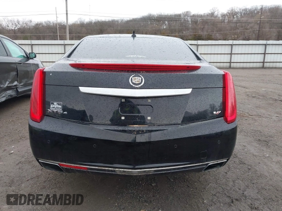 2014 Cadillac XTS Platinum with VIN 2G61W5S84E9291640, listed as a IAAI auction lot 41877867 with 100,462 mi miles and . Bid and sale history available at DreamBid. Image 16.