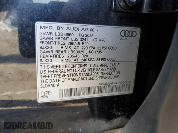 2018 Audi Q7 Premium Plus z VIN WA1LAAF74JD004058, wystawiony jako Copart lot #57092425 z przebiegiem 116 995 mil mil oraz Czysty tytuł • Clean title. Historia ofert i sprzedaży dostępna na DreamBid. Obrazek 13.
