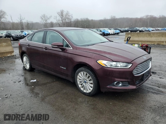 2013 Ford Fusion SE Hybrid with VIN 3FA6P0LU8DR168209, listed as a Copart auction lot 51796085 with Not Provided miles and Clean Title. Bid and sale history available at DreamBid. Image 4.
