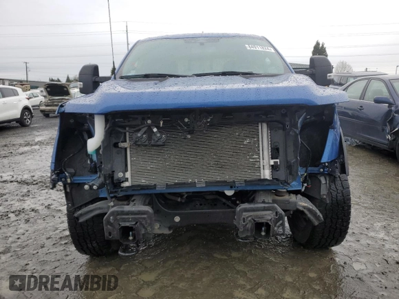 2022 Ford F-150 XL with VIN 1FTFW1E57NKD84700, listed as a Copart auction lot 84911824 with 30,300 mi miles and Salvage Title. Bid and sale history available at carsss.com. Image 5.