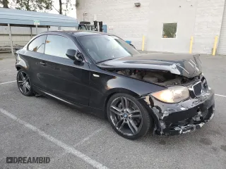 2011 BMW 1 Series 135i with VIN WBAUC9C59BVM10741, listed as a Copart auction lot 79583304 with 128,300 mi miles and Salvage Title. Bid and sale history available at carsss.com. Image 4.
