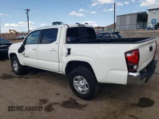 2021 Toyota Tacoma SR with VIN 3TYAX5GN5MT015924, listed as a Copart auction lot 59523615 with 79,693 mi miles and Salvage title. Bid and sale history available at DreamBid. Image 2.