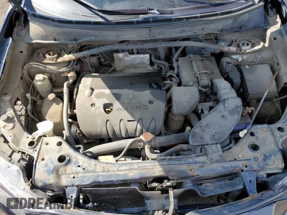 2010 Mitsubishi Outlander z VIN JA4AT2AWXAZ606259, wystawiony jako Copart lot #65532304 z przebiegiem 256 081 mil mil oraz Szkoda całkowita • Salvage title. Historia ofert i sprzedaży dostępna na DreamBid. Obrazek 11.