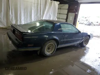 1987 Pontiac Firebird with VIN 1G2FS21S4HN213083, listed as a Copart auction lot 69101254 with 172,214 mi miles and Salvage title. Bid and sale history available at DreamBid. Image 3.
