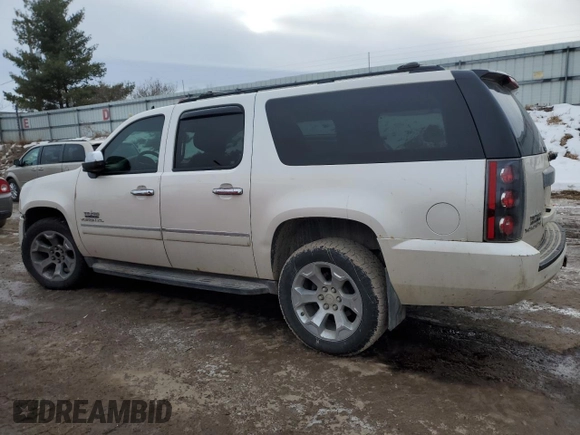 2011 GMC Yukon XL SLT with VIN 1GKS1KE06BR217663, listed as a Copart auction lot 43960245 with 215,703 mi miles and Salvage Title. Bid and sale history available at carsss.com. Image 2.
