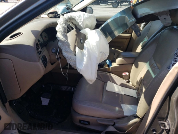 2003 Ford Taurus SEL Deluxe with VIN 1FAFP56S93G222243, listed as a Copart auction lot 46496165 with 193,282 mi miles and Salvage Title. Bid and sale history available at DreamBid. Image 7.