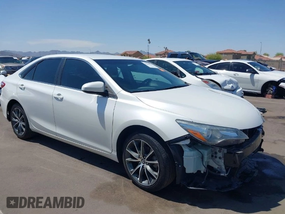 2015 Toyota Camry XLE with VIN 4T1BF1FK4FU477825, listed as a IAAI auction lot 41988429 with 156,886 mi miles and . Bid and sale history available at DreamBid. Image 1.