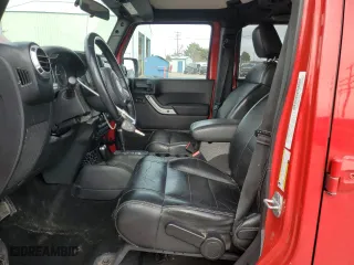 2012 Jeep Wrangler Unlimited Sahara with VIN 1C4BJWEGXCL223261, listed as a Copart auction lot 49350525 with 153,256 mi miles and Salvage Title. Bid and sale history available at carsss.com. Image 7.