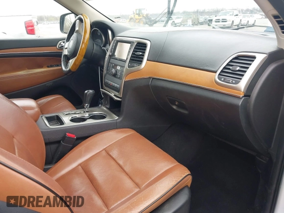 2013 Jeep Grand Cherokee Overland with VIN 1C4RJECG5DC648593, listed as a IAAI auction lot 41576630 with 187,098 mi miles. Bid and sale history available at carsss.com. Image 5.