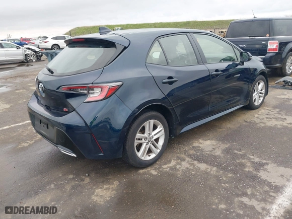 2021 Toyota Corolla Hatchback SE with VIN JTND4MBE8M3107240, listed as a IAAI auction lot 41570554 with 35,583 mi miles. Bid and sale history available at carsss.com. Image 4.