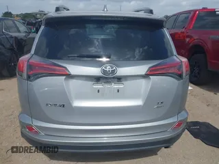 2018 Toyota RAV4 LE with VIN 2T3BFREV8JW758553, listed as a IAAI auction lot 42539300 with 116,337 mi miles and . Bid and sale history available at DreamBid. Image 16.