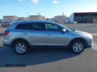 2015 Mazda CX-9 Sport with VIN JM3TB2BA3F0464294, listed as a IAAI auction lot 40848645 with 116,778 mi miles and . Bid and sale history available at carsss.com. Image 13.