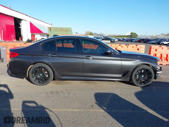 2018 BMW 5 Series 540i with VIN WBAJE5C58JG918692, listed as a IAAI auction lot 41665415 with 61,261 mi miles and . Bid and sale history available at carsss.com. Image 14.