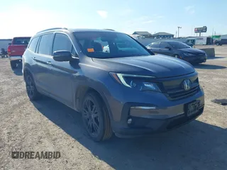 2021 Honda Pilot Special Edition with VIN 5FNYF5H27MB040801, listed as a IAAI auction lot 41656669 with 54,764 mi miles and . Bid and sale history available at carsss.com. Image 1.