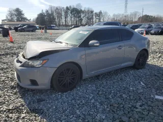 2012 Scion tC z VIN JTKJF5C78C3040542, wystawiony jako Copart lot #43595925 z przebiegiem 160 106 mil mil oraz Szkoda całkowita • Salvage title. Historia ofert i sprzedaży dostępna na DreamBid. Obrazek 1.