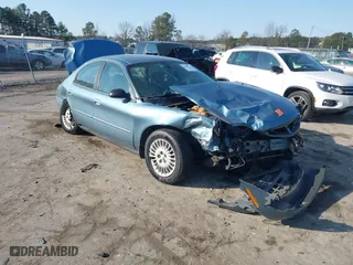 2005 Mercury Sable GS with VIN 1MEFM50U95A602863, listed as a IAAI auction lot 41409391 with 1 mi miles. Bid and sale history available at carsss.com. Image 1.