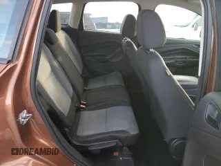 2017 Ford Escape S with VIN 1FMCU0F79HUE12519, listed as a Copart auction lot 86373094 with 144,446 mi miles and Salvage title. Bid and sale history available at DreamBid. Image 11.