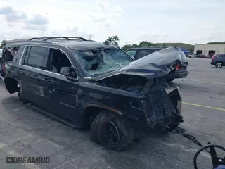 2018 Chevrolet Suburban LT with VIN 1GNSKHKCXJR356680, listed as a IAAI auction lot 41867318 with 332,052 mi miles. Bid and sale history available at carsss.com. Image 1.