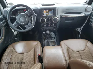 2016 Jeep Wrangler Unlimited Sahara with VIN 1C4BJWEGXGL245041, listed as a Copart auction lot 88099245 with 134,768 mi miles and Salvage title. Bid and sale history available at DreamBid. Image 8.