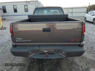 1999 GMC Sonoma SLS with VIN 1GTCS19W8XK514374, listed as a Copart auction lot 80079974 with 78,304 mi miles and Salvage Title. Bid and sale history available at carsss.com. Image 6.