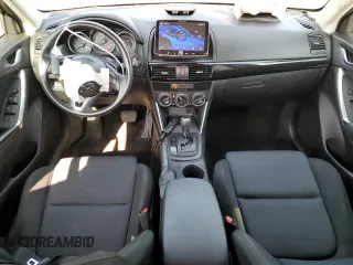 2014 Mazda CX-5 Sport z VIN JM3KE4BE1E0359446, wystawiony jako Copart lot #54562545 z przebiegiem 128 150 mil mil oraz Szkoda całkowita • Salvage title. Historia ofert i sprzedaży dostępna na DreamBid. Obrazek 8.