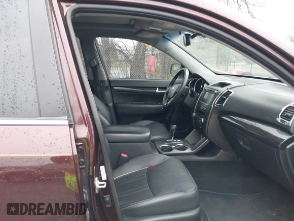 2013 Kia Sorento SX with VIN 5XYKWDA20DG370685, listed as a IAAI auction lot 42084027 with 1 mi miles. Bid and sale history available at carsss.com. Image 5.